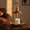 Brown leather cone shade lit over a glass jar candle, wood base on a side table, the GODONLIF wooden candle warmer lamp