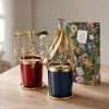 Daylight view on a light wood table with the printed gift box behind, a centerpiece for christmas table settings