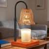 GODONLIF Classic candle warmer lamp in matte black with an amber petal glass shade on a square cherry wood base in a living room